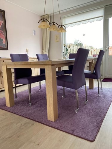 Set van 4 leren eetkamerstoelen - met wieltjes - paars leer