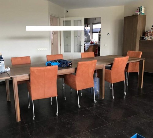 Set van 7 leren eetkamerstoelen met wieltjes en armleuning - bruin leer