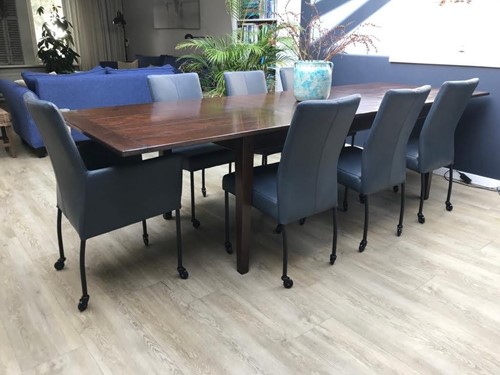 Set van 7 leren eetkamerstoelen - met wieltjes - blauw leer