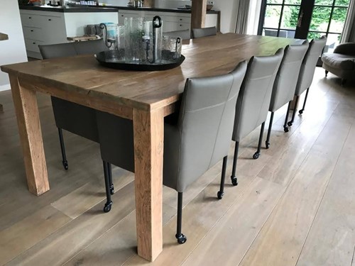 Set van 8 leren kuip eetkamerstoelen - met wieltjes - bruin leer