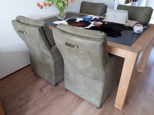 Set van 4 leren eetkamerfauteuils - met armleuning en wieltjes - groen leer